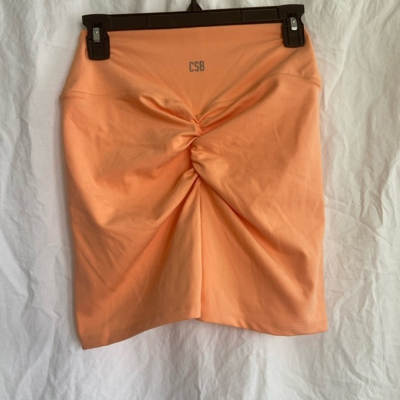 CSB crop shop boutique SERENITY SCRUNCH SHORTS 4" | light orange Size XL - Picture 6 of 9